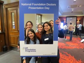 Foundation doctors posing together in a NFDPD selfie frame