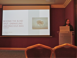 Dr Doanna Daoud (UKFPO Fellow) presenting on unconscious bias