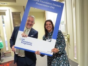 Dr Mike Masding and Elaine Colaco posing together in a NFDPD selfie frame