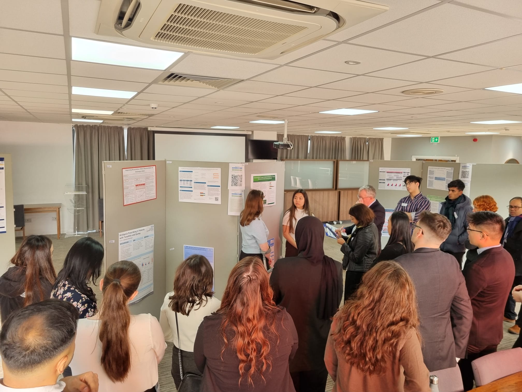 Image of foundation doctor presenting their poster abstract