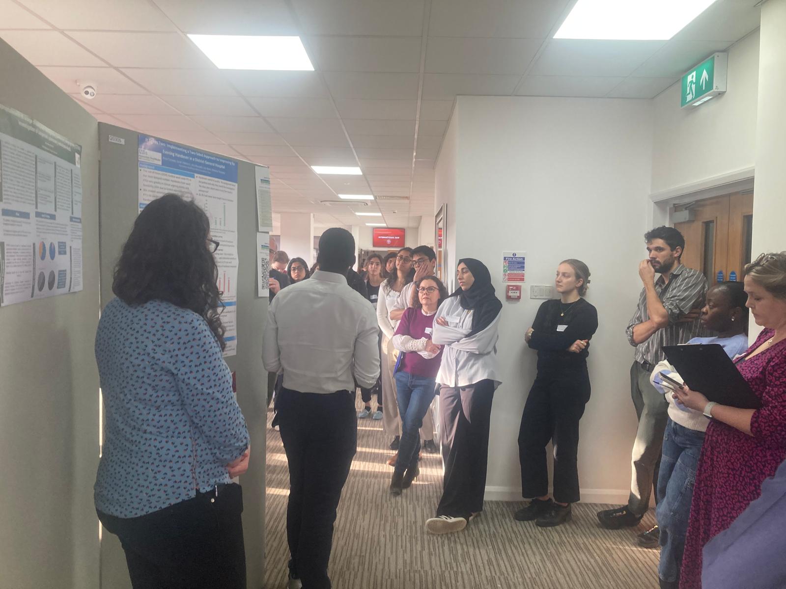 Image of foundation doctor presenting their poster abstract