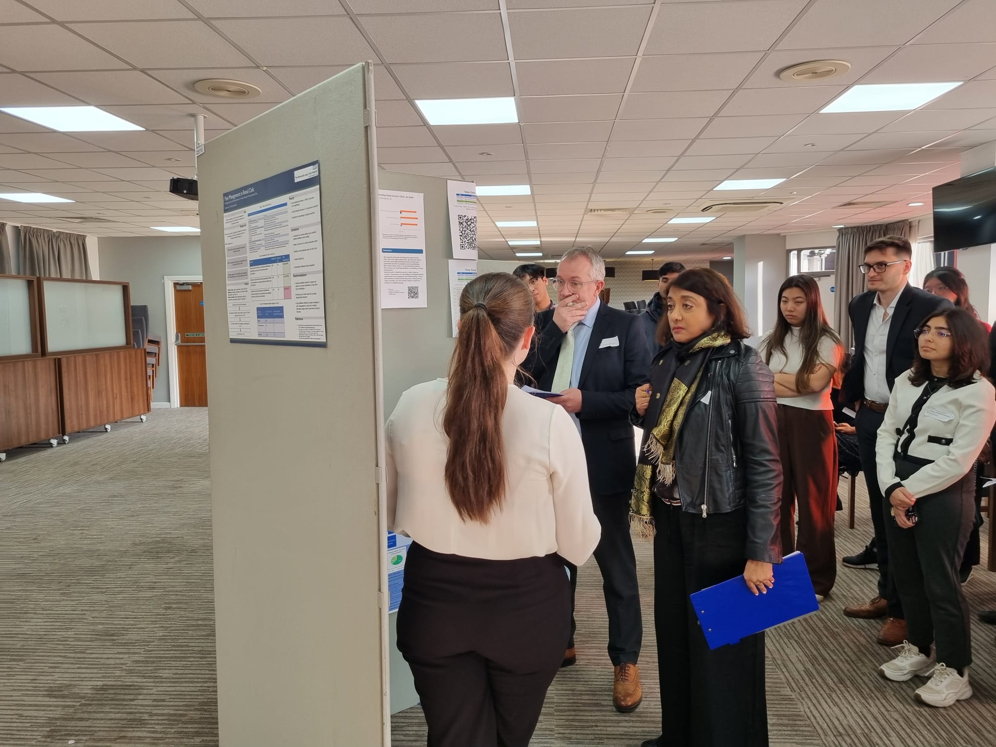 Image of foundation doctor presenting their poster abstract