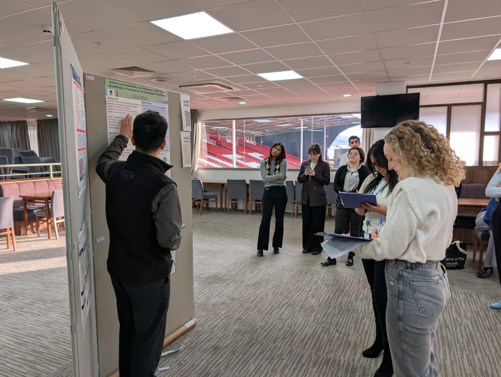 Image of foundation doctor presenting their poster abstract