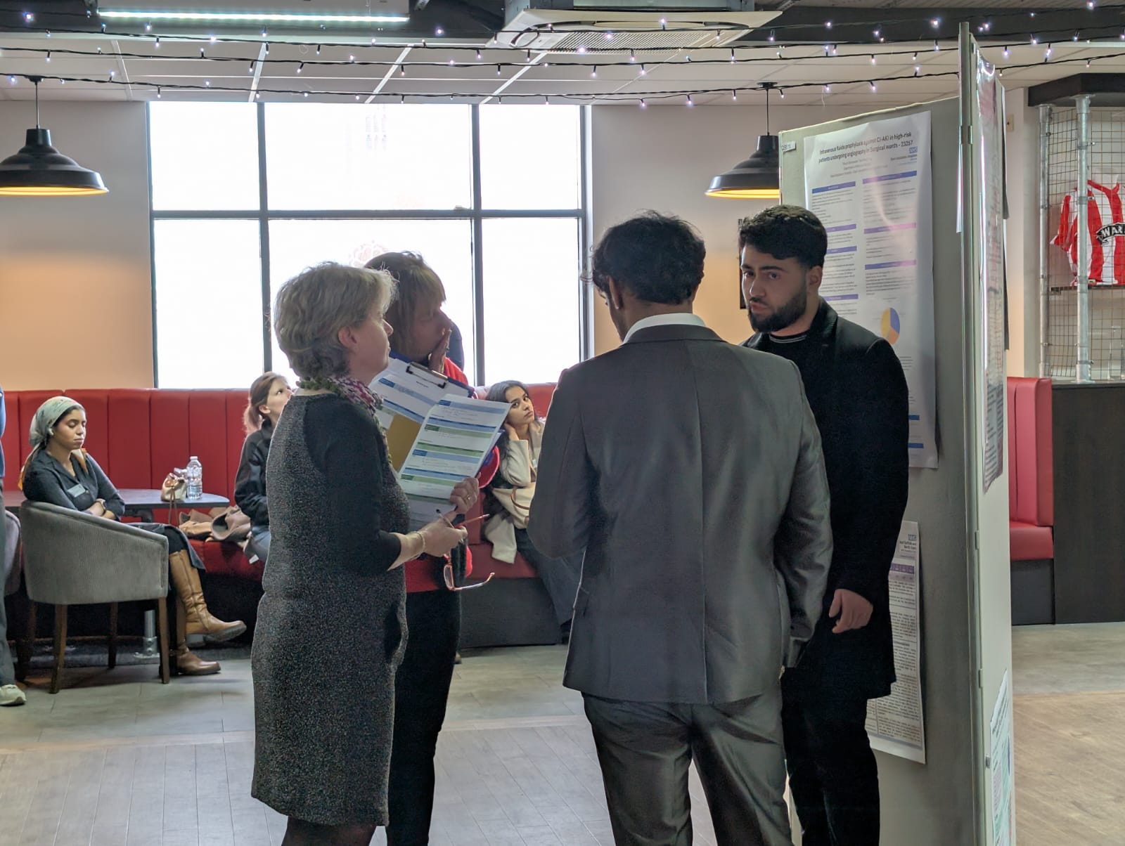 Image of foundation doctor presenting their poster abstract