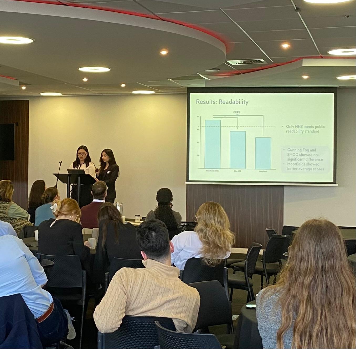 Audience listening to a presentation in the main hall 