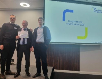 Image of Dr Joseph Cannon and Dr Samuel Harvey winner of their presentation group receiving their certificate presented by Dr Mike Masding 
