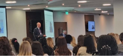 Image of key speaker Professor Chris Whitty talking to the audience